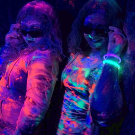 Neon colors can be used for both night and day events.  Under UV lighting, colors glows.