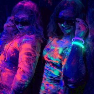 Neon colors can be used for both night and day events.  Under UV lighting, colors glows.